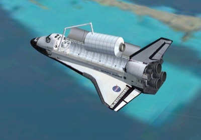 Space Shuttle Atlantis in orbit with cargo doors open