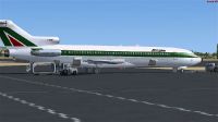 Alitalia Boeing 727-200 on tarmac.