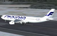 Finnair Airbus A340-300 on runway.