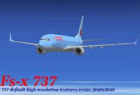 Neos Boeing 737-800 V2 against a blue sky.