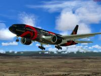 Team Alinghi Boeing 777-200 taking off.