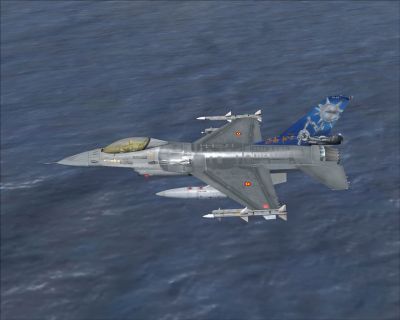 AS F-16AM 349SQN flying over water.
