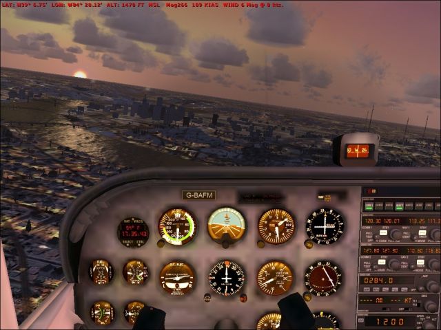 Cessna 172 over Cincinnati Ohio at sundown. From the Microsoft Flight Simulator X gallery.