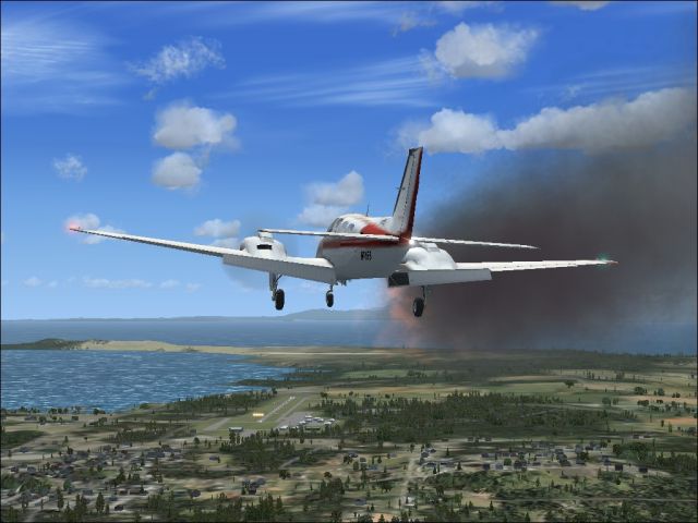 Engine fire over British Columbia. From the Microsoft Flight Simulator X gallery.