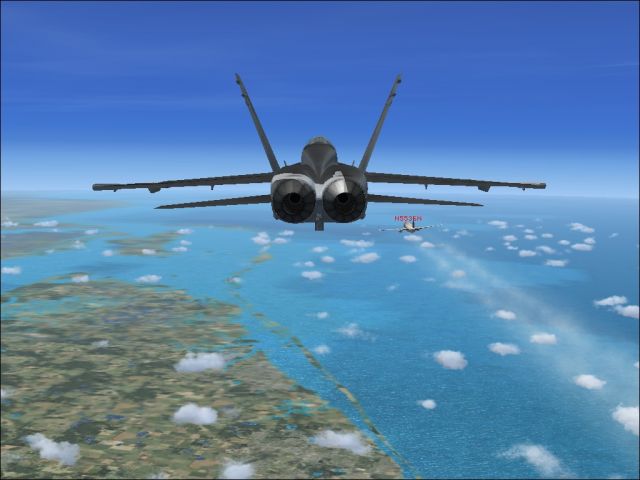 F-18 overtaking 737-800 27,000 feet west edge of Florida. From the Microsoft Flight Simulator X gallery.