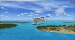 De Havilland Beaver about 300 ft over the Caribbean Islands