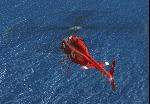 Helicopter cruising over the sea
