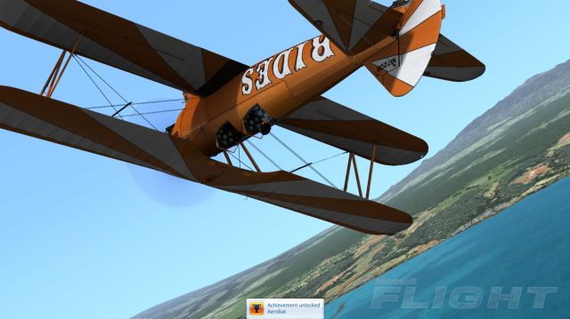 Unlocking an Achievement in an Aerobat. From the Microsoft Flight gallery.