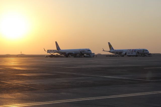Double Condor on ramp with sunset. From the Aircraft and Aviation gallery.