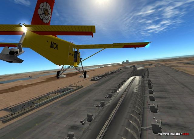 Pilatus PC-6 over Dubai International. From the X-Plane gallery.