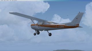 Screenshot 2 — Orange Cessna 152 C-GZBX