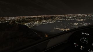 The cockpit overlooks a river bordered by city lights at night, with illuminated analog gauges and registration EC-KCN visible on the panel.