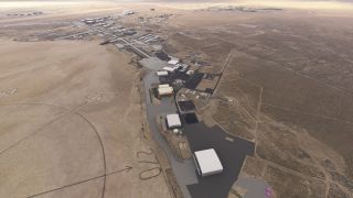 A desert airfield features white-roofed hangars, paved aprons, and large numbered markings with arrows across the adjacent dry lakebed.