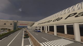 Cars line an airport terminal access road beside a blue-and-white bus, white support columns, and pedestrian crossings beneath dark clouds.