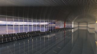 An empty airport terminal features rows of black seats, reflective flooring, and floor-to-ceiling windows overlooking the apron and a jet bridge.