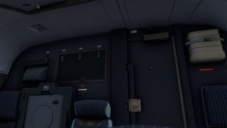 The rear cockpit area contains blue upholstered jump seats, a closed door, and a wall-mounted breathing hood container.