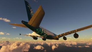 A four-engine airliner with green geometric livery flies above scattered clouds, viewed from below and behind in warm sunlight.