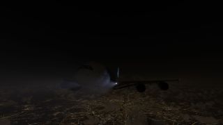 A four-engine airliner flies above illuminated city streets and scattered clouds at night, with wing lights visible from the front.