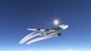 A four-engine Airbus A380 in blue and white livery flies overhead, trailing white contrails across a clear sky beneath bright sunlight.