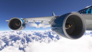 Two blue turbofan engines with visible fan blades hang beneath an airliner’s wing as it flies above dense white clouds.