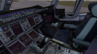 The cockpit contains illuminated flight displays, a central throttle quadrant, a right-hand sidestick, and an empty blue copilot seat.