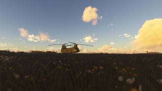 A tandem-rotor helicopter sits near airport buildings, with tall grass and wildflowers in the foreground beneath golden clouds.