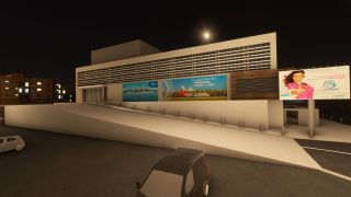 A floodlit building displays Air Tahiti and Air Tahiti Nui advertisements above a sloping access ramp, with cars outside at night.
