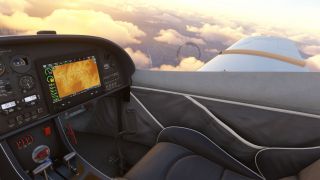 The cockpit shows a terrain navigation display, analog gauges, and an empty seat beside a white wing above sunlit clouds.
