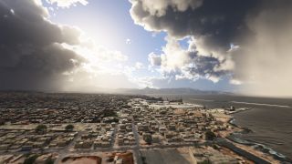A coastal city stretches beside a harbor with cranes and breakwaters, beneath towering clouds and rain showers over the sea.