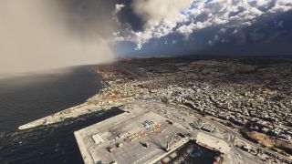 A coastal city surrounds a harbor with container yards and cranes, while an airport runway extends beneath storm clouds and a faint rainbow.