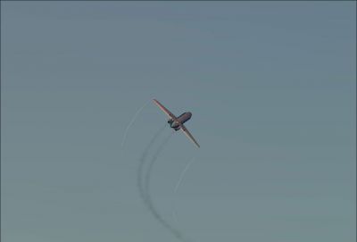 BAC 1-11-200 in flight leaving smoke trails.