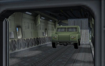 Cargo bay with military truck loaded