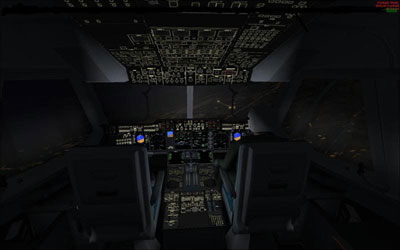 Cockpit of A400 at night flying over Salzburg