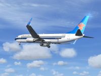 China Southern Boeing 737-800 with landing gear lowered.