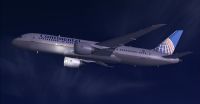 Continental Boeing 787-8 flying at night.