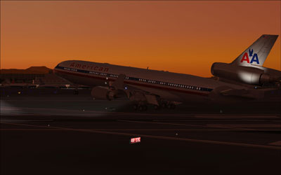 American Airlines MD-11 landing at dusk