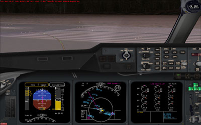 MD-11 glass cockpit display with night lights turned on
