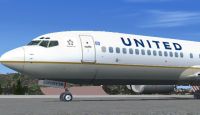 United Airlines 737-900ER on tarmac.