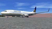 United Airlines Boeing 737-800 on tarmac.