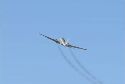 Screenshot of Convair CV580 in flight leaving smoke trails.