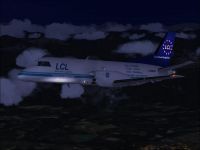 Screenshot of LCL Cargo Saab 340F in the air at night.