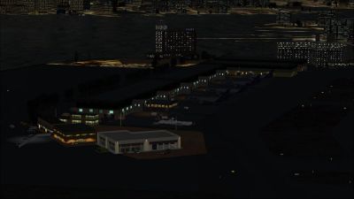 Aerial view of Boston/Logan International Airport at night.