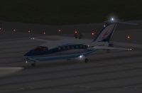 Screenshot of P180 'Avanti Evolution' on runway.