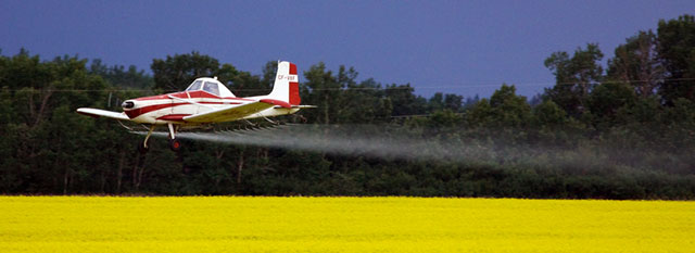 Cessna AGwagon spraying crops
