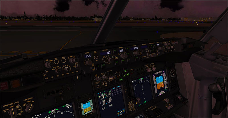 Example of a Boeing 737 cockpit at night.