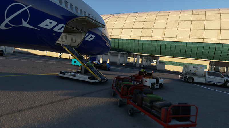 Boeing 787 side cargo door with loading underway.