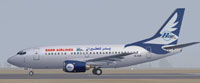 Screenshot of Badr Airlines Boeing 737-500 on runway.
