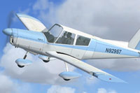 Screenshot of blue and white Zlin 43 N92957 in flight.