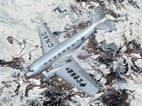 Screenshot of CNAC Douglas DC-2 flying over mountains.