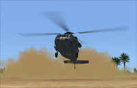 Screenshot of Helicopter landing and kicking up a lot of dust.